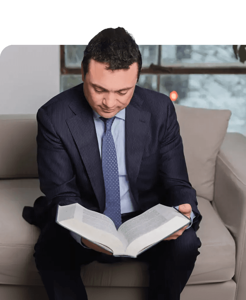Sam Pastor reading a law book